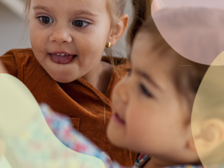 Two toddlers playing together